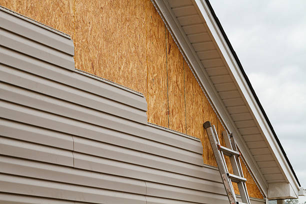 Professional Siding Installation technician working in Bloomington, IN